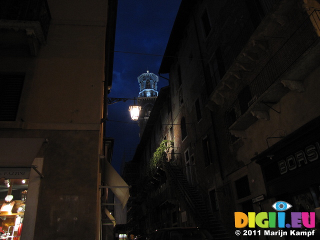 SX19421 Balcony with Lamberti Tower at night in Verona, Italy